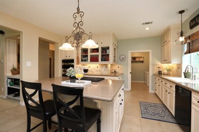 Kitchen with Stainless appliances, Gas cooktop, Granite and tons of cabinets!
