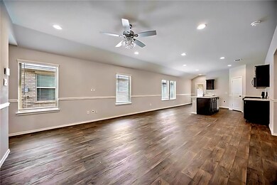 Open concept living kitchen and dining.