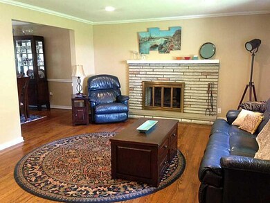 Living Room. Beautiful hardwood floors, wood burni