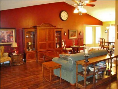 Living room has vaulted ceiling