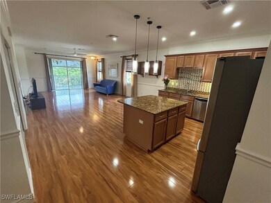 Kitchen featuring appliances with stainless steel