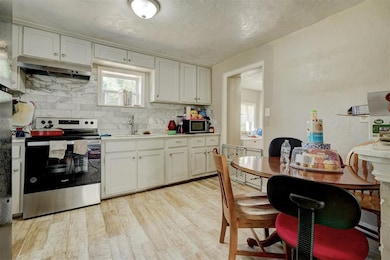 Kitchen featuring appliances with stainless steel 