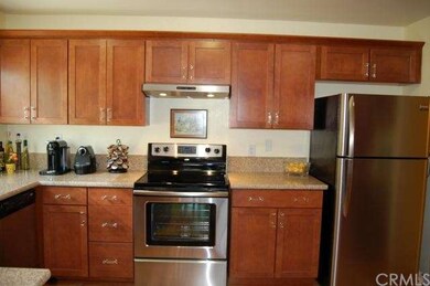 Stainless Steel Appliances! Maple Cabinetry.