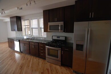 6134 N Washtenaw Ave unit 2R, Chicago, IL 60659 - photo 3