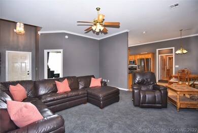 Open floor plan from living room to office, dining