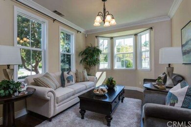 This charming Living Room or Home Office greets yo