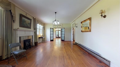 Formal Gathering Room with Fireplace