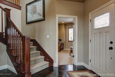 Entry foyer w/hand-scraped oak floors