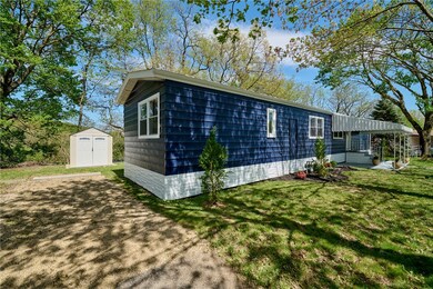 Gravel Parking area for the owner. Shed is in the