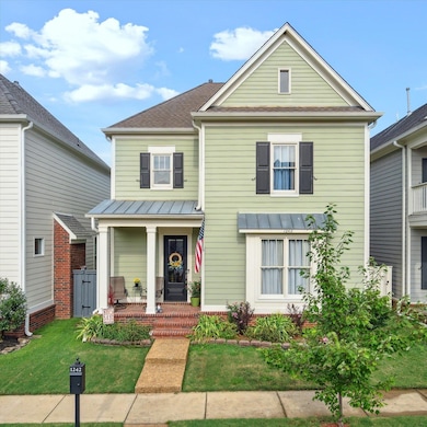 View of front of house featuring a front lawn