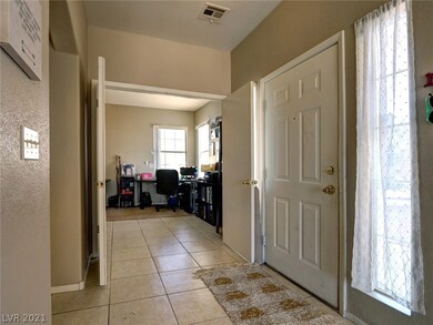 Entry foyer looking into the Den