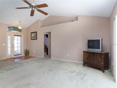 Front door and great room with a view to 3rd bedro