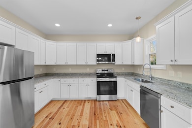 Kitchen featuring appliances with stainless steel 