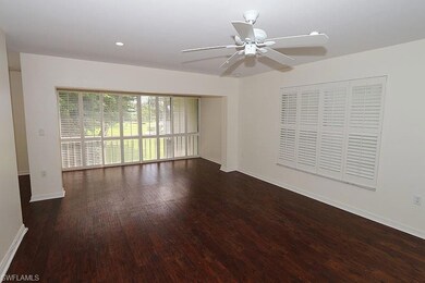 Unfurnished room with dark wood-type flooring and 