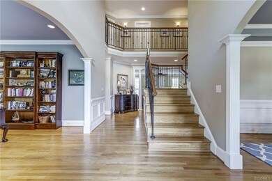 Grand 2-story foyer. Front and rear staircases wit