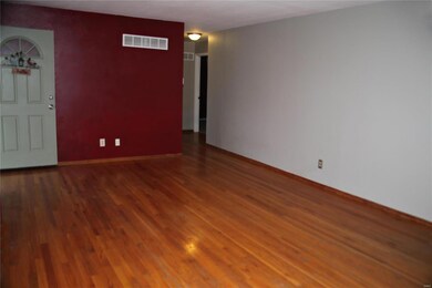 Large living room with beautiful hardwood floors