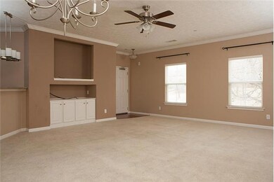 Great built in tv space and cabinets in your living room. Open spacious feel.