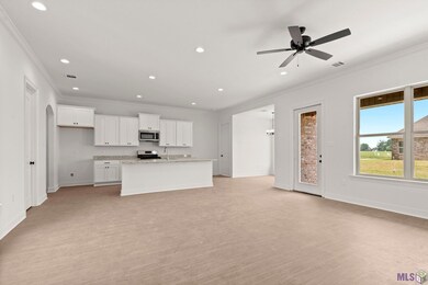 Living room looking towards dining and kitchen