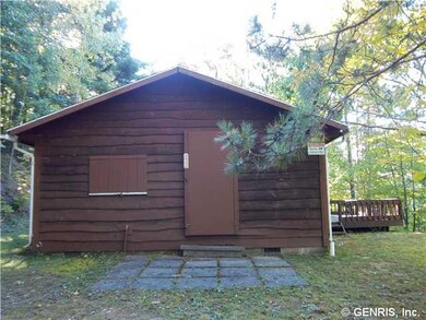 Exterior Front. Larger cabin has an open deck for 