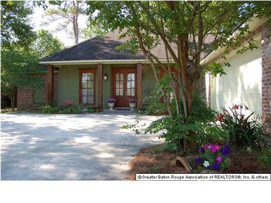Beautiful landscaping in front of home.