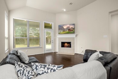 View from the kitchen into the family room and back yard.