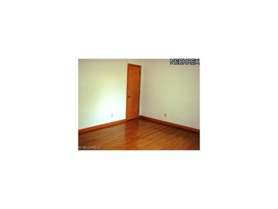 Home features hardwood floors throughout. Spacious