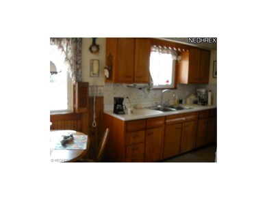Bright eat in kitchen, all appliances stay.