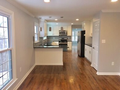 Dining Room to Kitchen to Den.