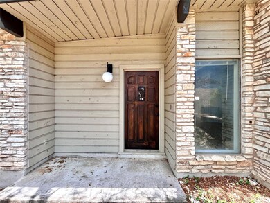 Property entrance with brick siding