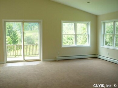 Living Room. Great room offers an abundance of sun
