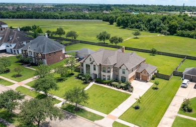It presents a stately residence with graceful symm
