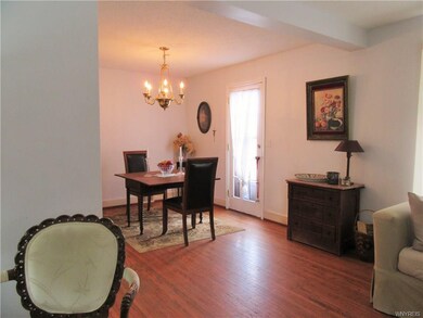 Formal dining room leads to the stamped concrete p