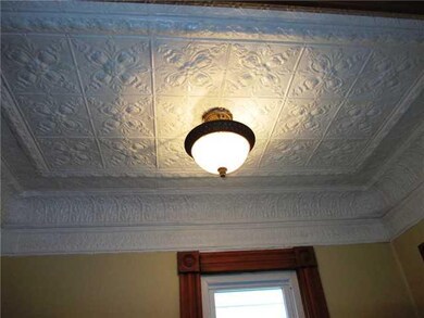 Foyer. TIN CEILING DETAIL.