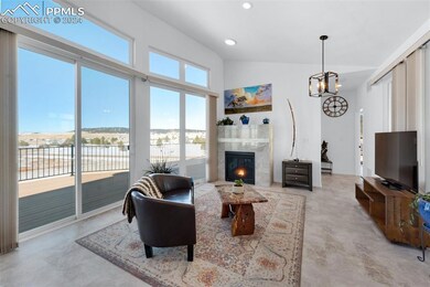Living room with lofted ceiling and huge windows t