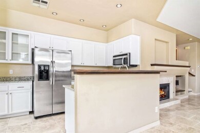 Kitchen adjoins both dining and living room creati