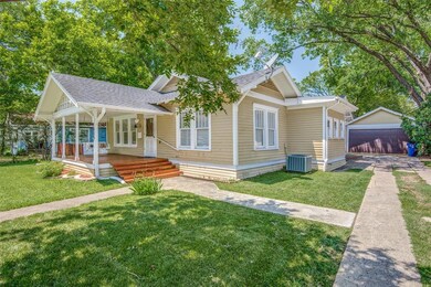 THIS AMAZING COTTAGE ALSO HAS A 2 CAR GARAGE!