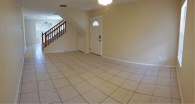 LIVING ROOM LOOKING AT MAIN ENTRANCE (RIGHT)