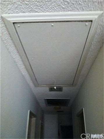 PULL DOWN  ATTIC STORAGE IN HALLWAY