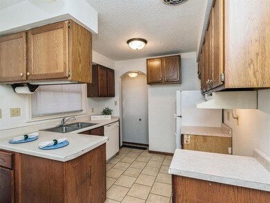 Kitchen with tiled floors.