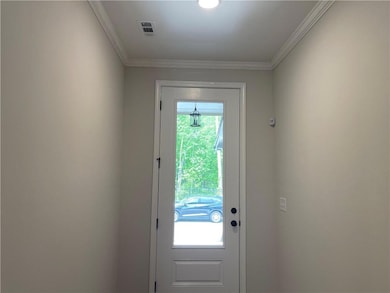 Lovely foyer with your 8' high front door and very generous wall space.