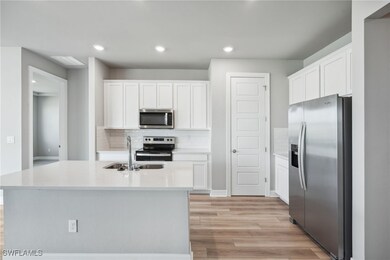 Photos are of a model home with the same floorplan