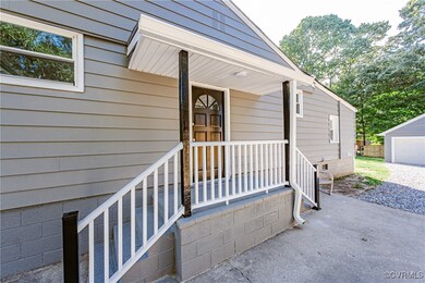Entrance to property with a porch