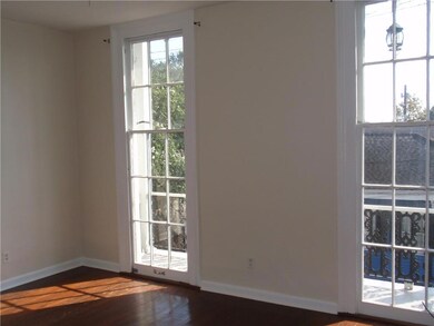 Front windows in living room to front balcony