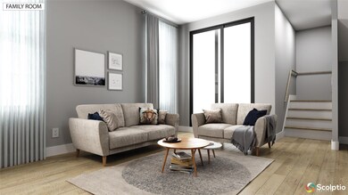 Living room featuring wood-type flooring and stai