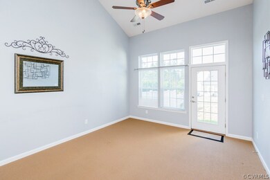 FAMILY ROOM W/ VAULTED CEILING. CEILING FAN, CARPE