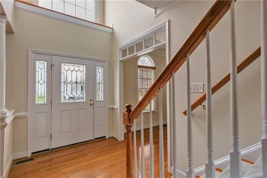 A beautiful bevelled  glass door and side lights.