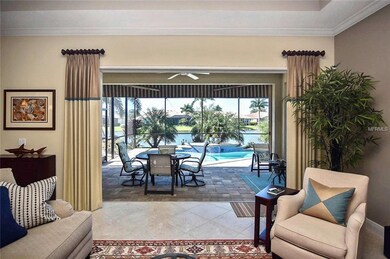 Living room with sliders to lanai/pool