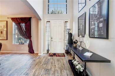 Grand Entrance through Foyer.
