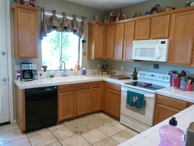 Kitchen Window to Charming Yard