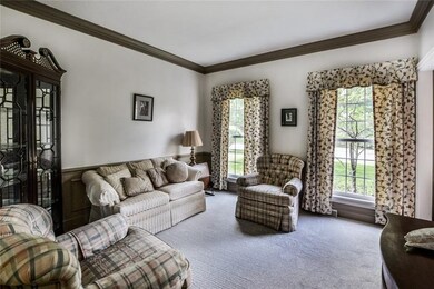 Neutral tones and crown molding will match any dec